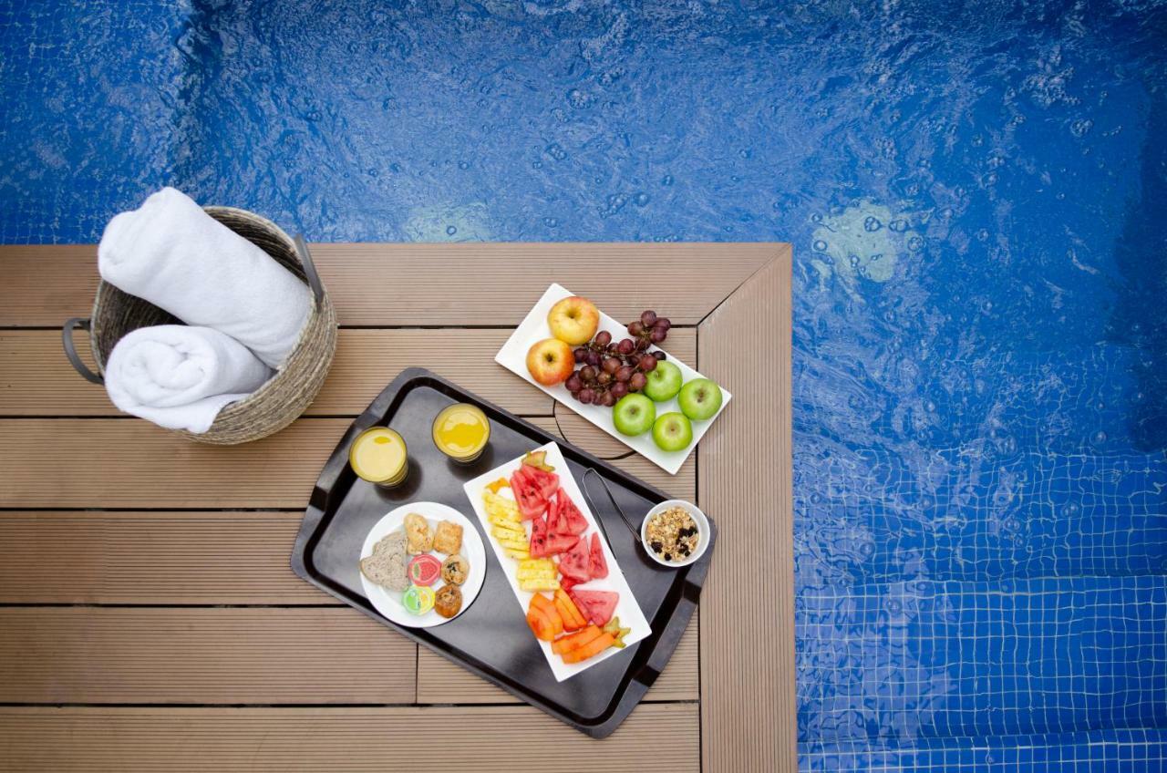 Quo Quality Hotel Manizales Eksteriør bilde A poolside snack